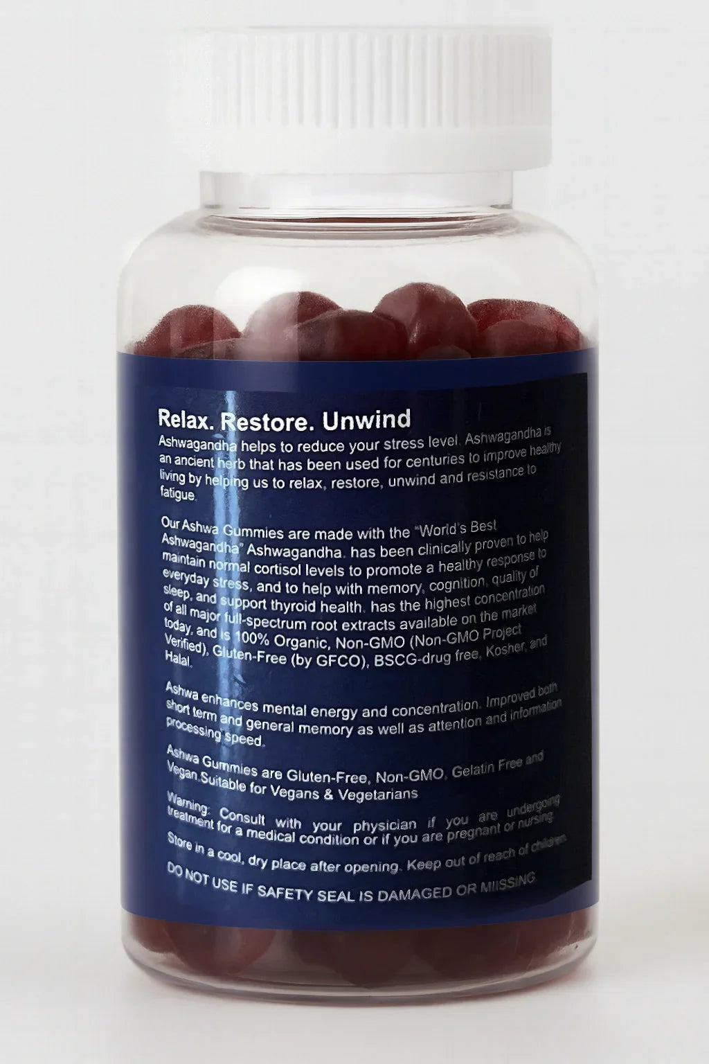 bottiglia di capsule rosse gommini ashwagandha con etichetta blu su sfondo bianco
