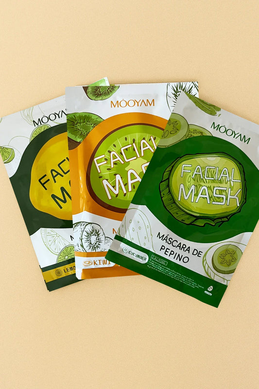Three Mooyam facial mask packages on a beige background