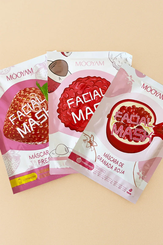 Three facial mask packages from Mooyam on a beige background
