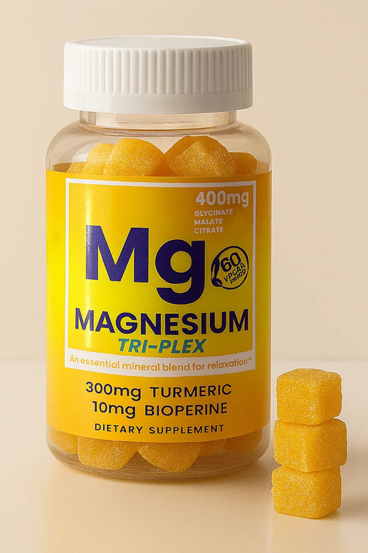 Supplement bottle labeled 'Mg Magnesium Tri-Plex' with yellow capsules on a beige background