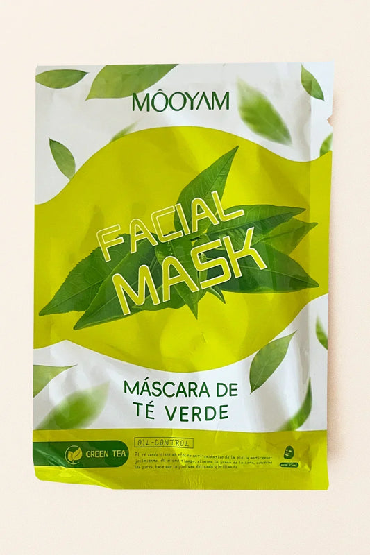 MooYam facial mask packaging with green leaves on a light background